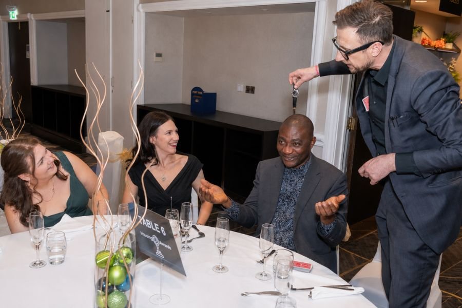 Guests captivated by a magician